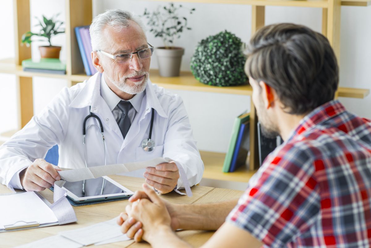 A doctor consulting with a patient